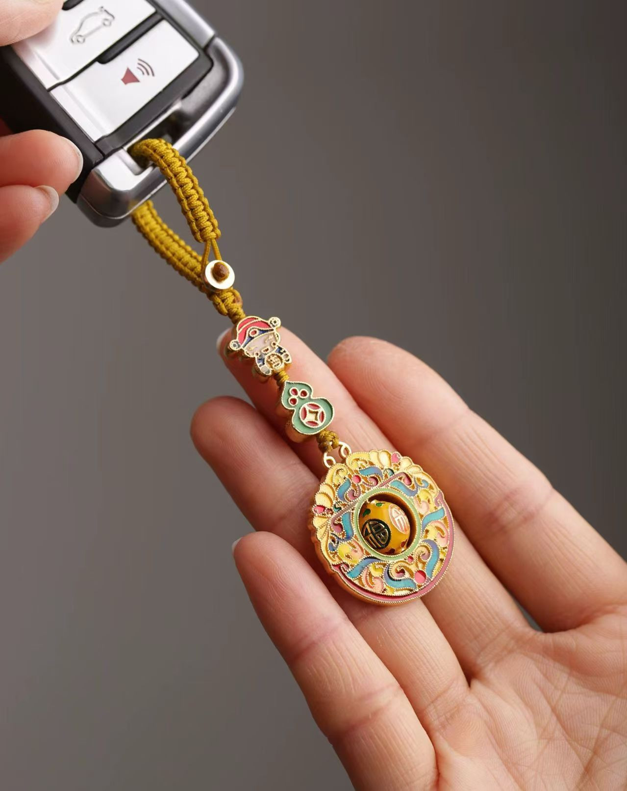 brass wealth god fortune bead keychain