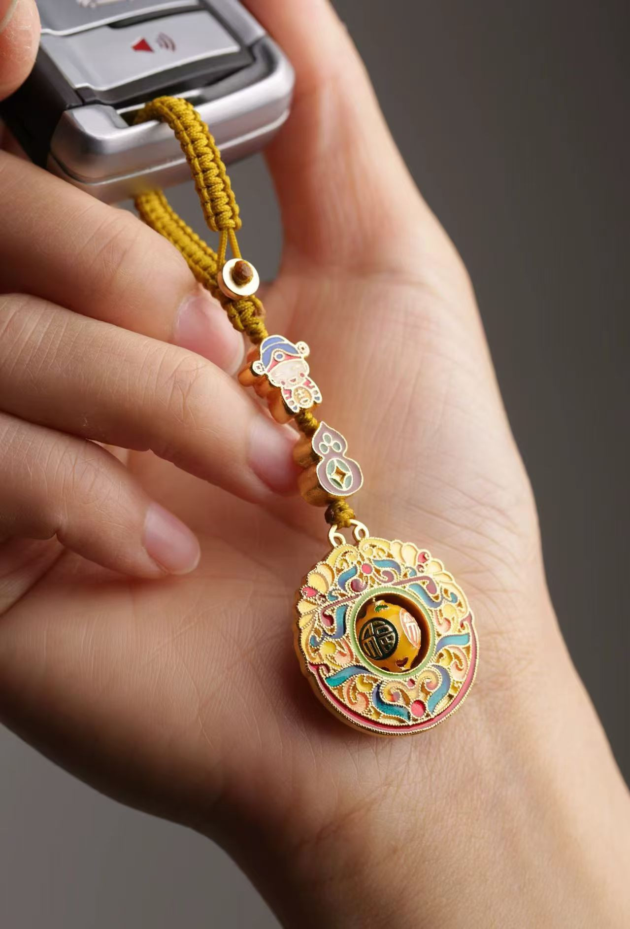 brass wealth god fortune bead keychain